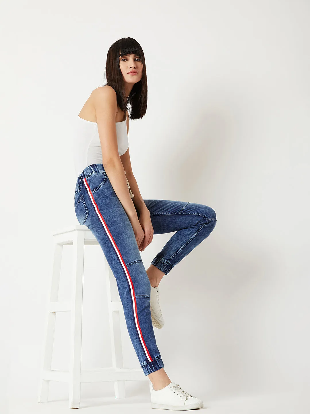 Women's Blue Relaxed Fit Mid Rise Regular Length Multicolor Twill Tape Detailing Denim Stretchable Jogger Pants